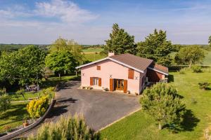 an aerial view of a pink house with a driveway at L'instant ROSE - Escapade Champêtre in Grazac