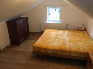 Postel nebo postele na pokoji v ubytování Apartments Šimákova Vila