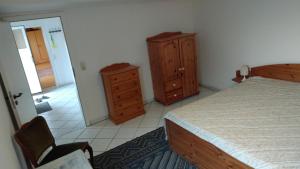 Ein Bett oder Betten in einem Zimmer der Unterkunft Fewo Bendig