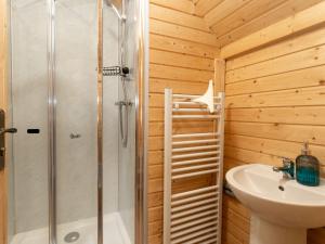 a bathroom with a shower and a sink at Chalet Oak Bothy by Interhome in Coldstone