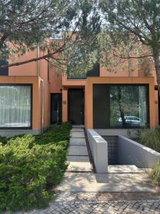 a building with a walkway in front of it at Authentic Charm C2 in Troia