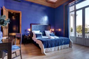 Cama ou camas em um quarto em Hotel Inglaterra - Charme & Boutique