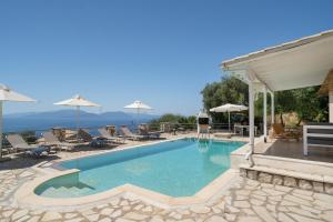 a pool at a villa with a view at Villa Olivia Panoramic Sea View in Lefkada