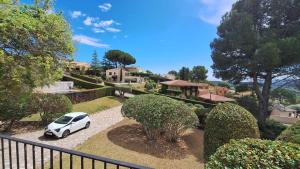 a white car parked in front of a house at TV 57 privat pool in Torroella de Montgrí +14 photos