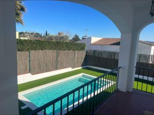 a swimming pool on the balcony of a house at Alemanya 38 in Torroella de Montgrí