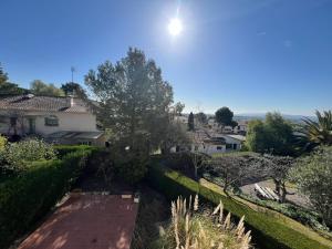 a view of a house with a brick pathway at Casa Buckingham 27C in Torroella de Montgrí