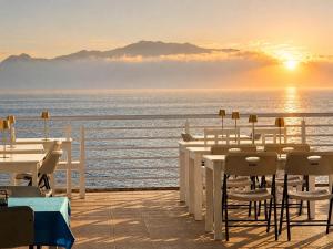 a view of the ocean from a restaurant on a ship at Cruzeiro Guest House in São Filipe