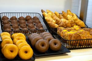 a display of different types of donuts and pastries at Muthu La Perla Tenerife in Puerto de la Cruz