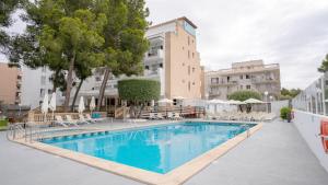 a large swimming pool in front of a building at BLUESEA Costa Verde in El Arenal +18 photos