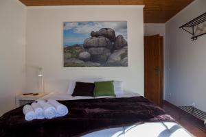 Ένα ή περισσότερα κρεβάτια σε δωμάτιο στο Casa Mariolas