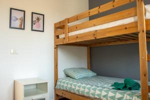 a bunk bed in a small room with a bunk beduten at Casa Be in Caleta De Fuste +14 photos
