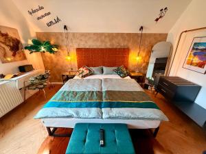 a bedroom with a large bed in a room at CASA Salzburg in Salzburg