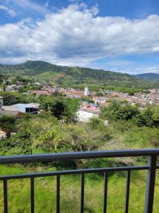a view of a city from a balcony at Espectacular apartamento en Guaduas in Guaduas