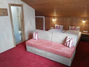 Postel nebo postele na pokoji v ubytování Landhaus Hubert Fiegl