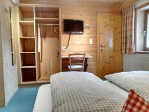 Postel nebo postele na pokoji v ubytování Landhaus Hubert Fiegl