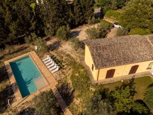 an overhead view of a house and a swimming pool at Villa Sara in Foligno