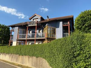 a house sitting on top of a hill at NEU! Ferienappartement Nino in Rötz +10 photos