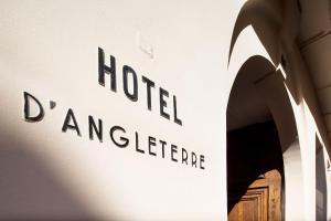a building with a sign that reads hotel at Hotel d'Angleterre in Paris