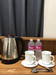 Facilități de preparat ceai și cafea la Feels like Home