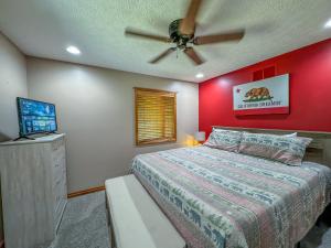 a bedroom with a bed and a ceiling fan at New: Lake Access with Dock Slip More in Swanton