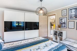a bedroom with a large glass wall at Fewo Franken in Goldkronach