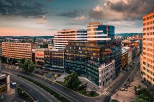 an aerial view of a city with tall buildings at Hotel Pupin Novi Sad in Novi Sad