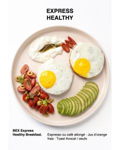 a plate of food with eggs and vegetables on it at Hola Luxury Appart in Dakhla +11 photos