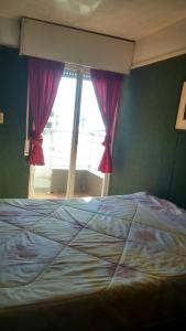 Cama o camas de una habitación en Piria Apartamento Bahiamar
