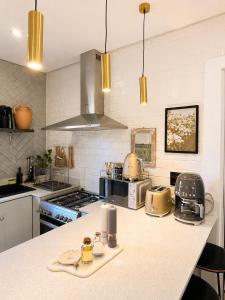 a kitchen with a stove and a counter top at Bergview Apartments in Hilton