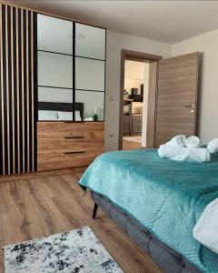 a bedroom with a bed and a large window at Kuća za odmor Terra Marta in Đakovo +31 photos