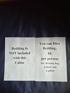 a white piece of paper with words on it at By The Way Campsite, Trekker, Nevis in Tyndrum
