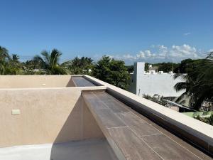 a view of a roof of a house at Villa Colibríes in Chelem