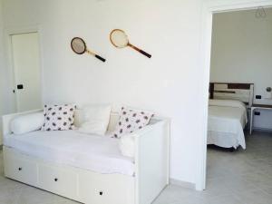 A bed or beds in a room at Casa Serradei
