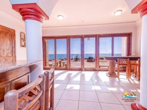 a kitchen with a view of the ocean at Casa Serenity Beachfront Rental in San Felipe