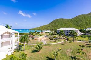 an aerial view of a resort and the ocean at Suite prestige Serenity Bay devant la plage in Anse Marcel 
