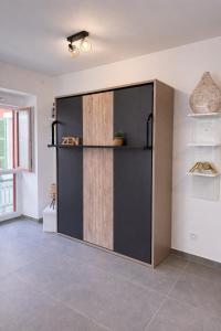 a large sliding door in a room at 105 - Voiron centre - DeTassigny in Voiron +2 photos