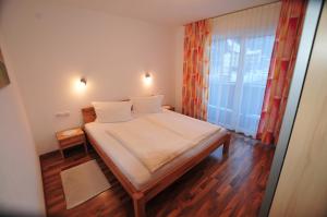 Letto o letti in una camera di Haus Scheiber