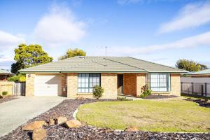 a house in the suburbs with a driveway at Nautilus Nest - Port Sorell in Port Sorell