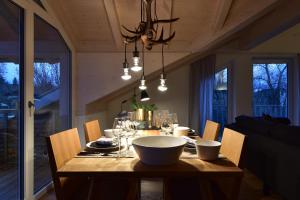 a dining room table with a bowl on top of it at Das Alpiente - Das Urlaubshaus im Allgäu in Sonthofen