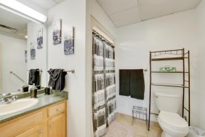 a bathroom with a toilet and a sink at Work, Play & Explore: 9-Unit New Kensington Base in New Kensington +47 photos