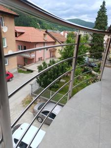 a balcony with a view of a parking lot at Zen Zone Trio in Foča