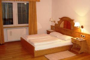 Postel nebo postele na pokoji v ubytování Hotel San Leonardo