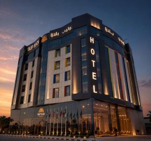 a building with a sign on the front of it at TULIP PLAZA - By Le Park Concord in Hafr Al-Batin