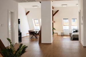 a living room with a couch and a table at ATRIO Apartments 3 in Trenčín