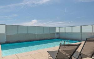 a swimming pool on top of a building at French Riviera Chic Cocoon - pool, beach, parking in Antibes