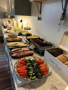 a buffet with many different types of food on display at Eleonora Bed & Breakfast in Kristinestad