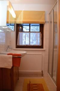 a bathroom with a sink and a window at Alte Schmiede in Bad Gastein