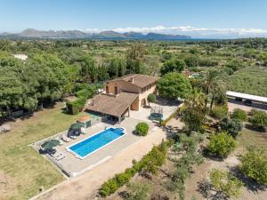 an aerial view of a house with a swimming pool at Luxury Villa Es Molinet in Alcudia