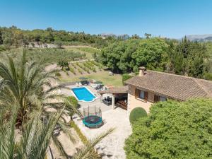an aerial view of a house with a swimming pool at Luxury Villa Es Molinet in Alcudia