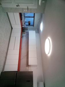 an overhead view of an empty room with a window at Be Netivei BE NETIVOTI in Netivot